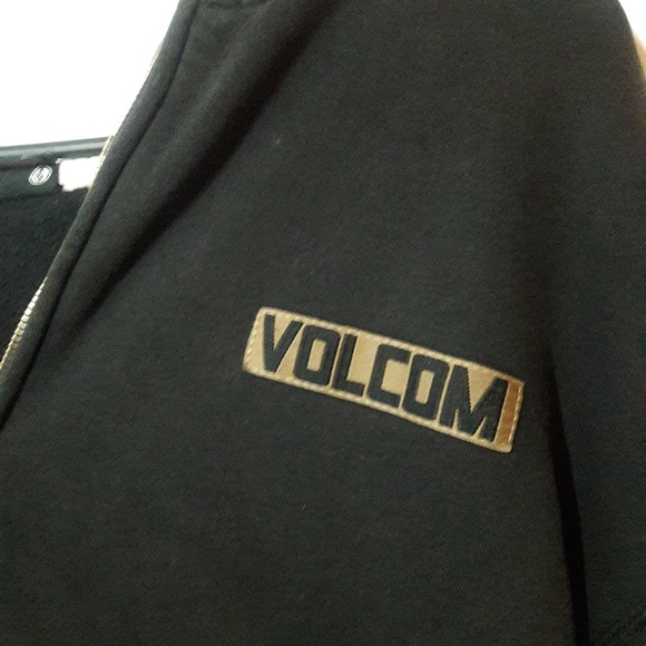 A black/gold colored Volcom Special Forces jacket - Picture 3 of 7